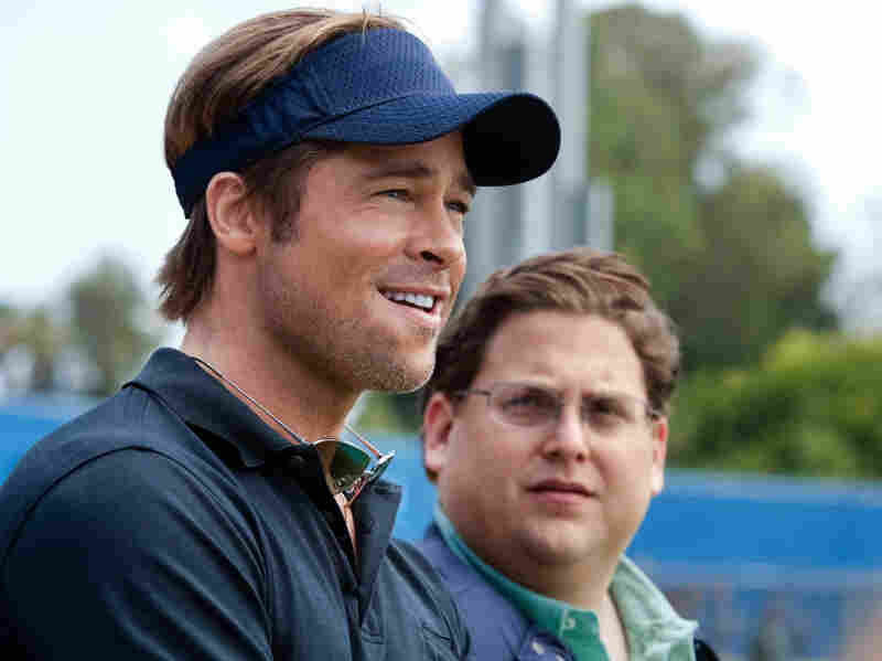 Brad Pitt, left, plays Billy Beane, the general manager of the Oakland A's, in the movie Moneyball. His assistant Peter Brand is played by Jonah Hill.