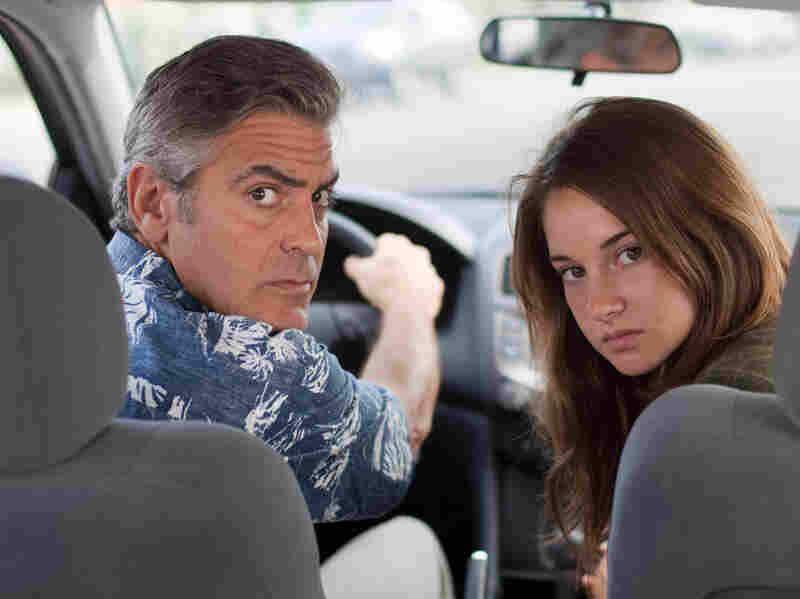George Clooney plays an indifferent husband and father to two daughters, including Shailene Woodley, in The Descendants.
