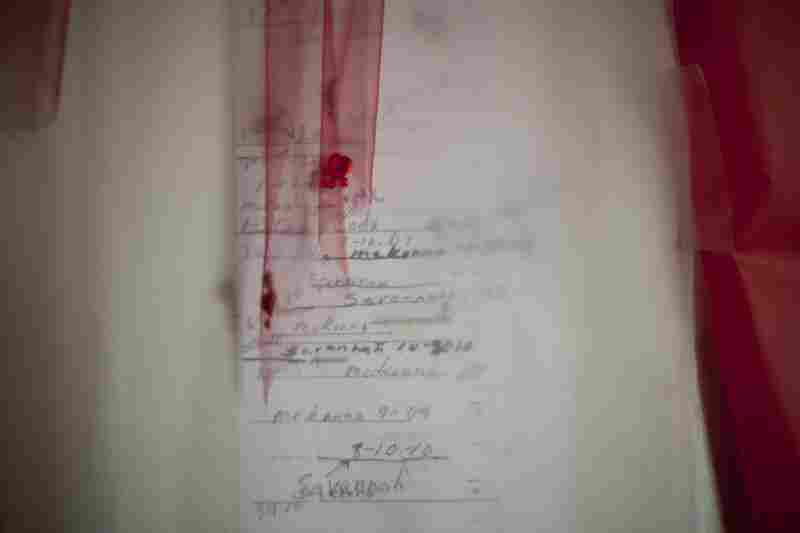 Under the Valentine's Day decorations in Lopez's bedroom is the growth chart for his children that his mother, Rosie Lopez, created while he was in prison.