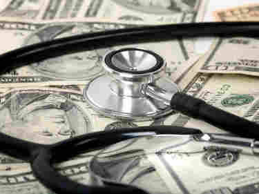 money; stethoscope