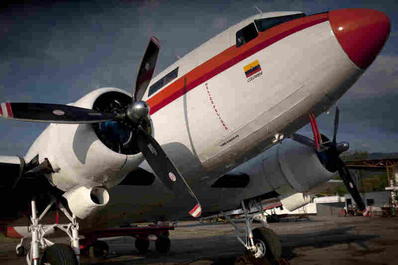 A DC-3 stands ready to take off on the runway in Villavicencio, Colombia, near the border of Brazil. 