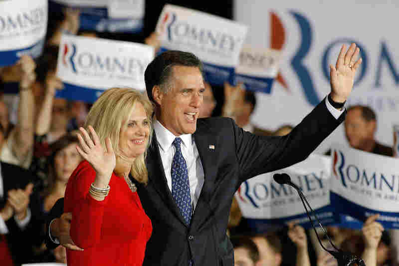 Mitt Romney and his wife Ann  celebrate their victory in the Illinois GOP primary in Schaumburg, Ill. 