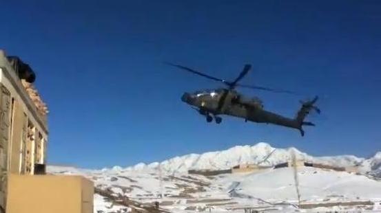 From video of the incident, as the helicopter swooped low over a snowy base in Afghanistan moments before crashing in the distance. (YouTube.com)