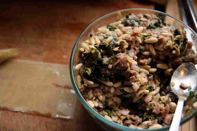 A filling of ground lamb, pine nuts, apples, aromatics, herbs and spices for the Tart-Sweet Lamb Borek.