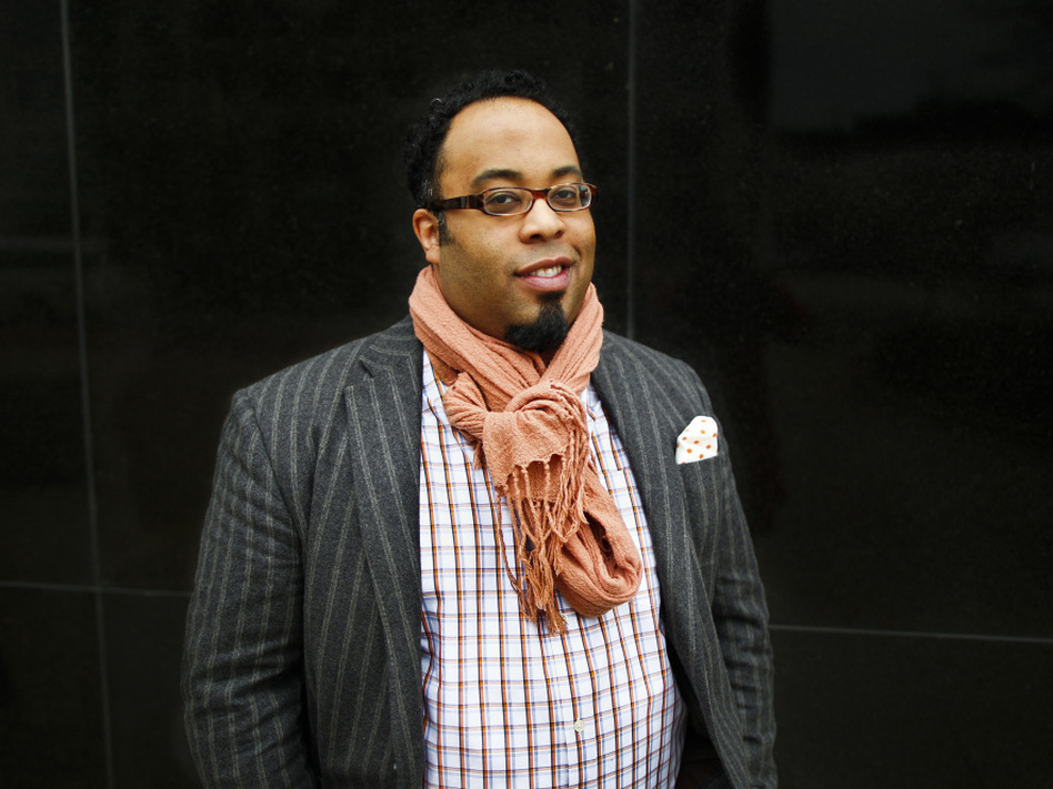 Poet Kevin Young visits NPR headquarters in Washington, D.C., on Friday as a NewsPoet guest. (Doriane Raiman/NPR)