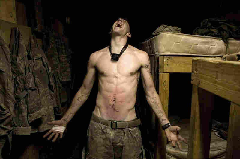 2007: Spc. Tad Donoho screams after being administered a "pink belly" for his birthday: Each member of the platoon strikes his stomach until it begins to bruise.