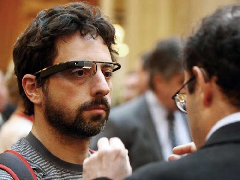 In this photo taken Thursday April 5, 2012 and provided by the Foundation Fighting Blindness, Google co-founder Sergey Brin wears Google's Project Glass prototype publicly for the first time while attending the Dining in the Dark charity function in San Francisco. We'll talk about 'Google Glasses' in our second hour.
