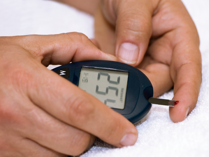 A person with diabetes may need to test blood glucose levels up to 10 times a day. (iStockphoto.com)