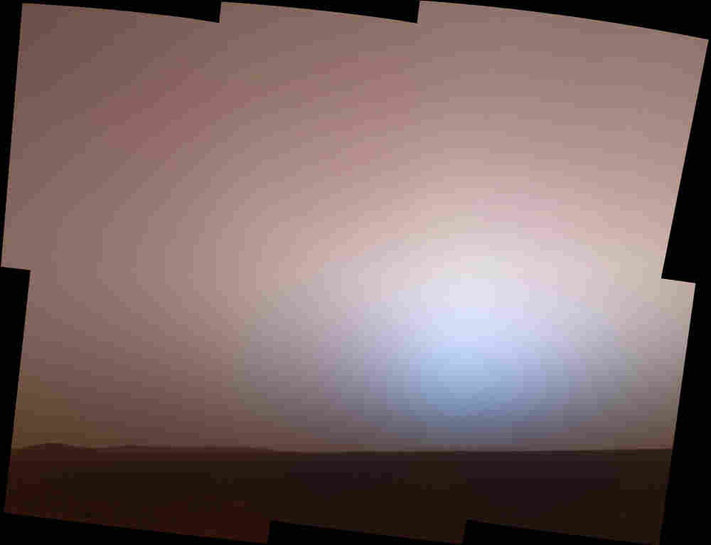 The martian twilight sky at Gusev crater, as imaged by the panoramic camera on NASA's Mars Exploration Rover Spirit around 6:20 in the evening of the rover's 464th martian day (April 23, 2005).