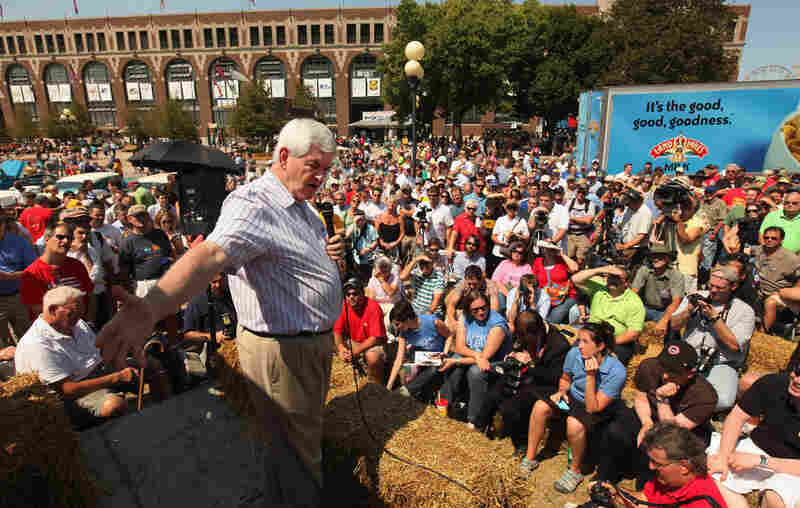 At the Iowa State Fair, Gingrich talks to voters from the Des Moines Register's soapbox on Aug. 12, 2011, in Des Moines, Iowa. 