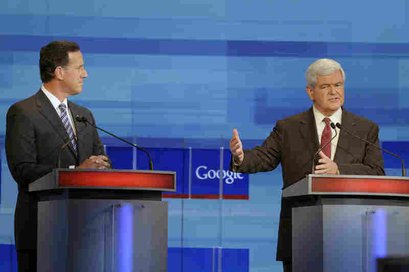 At the Fox News/Google GOP debate on Sept. 22, 2011, in Orlando, Fla., Gingrich makes a point as Rick Santorum looks on. 