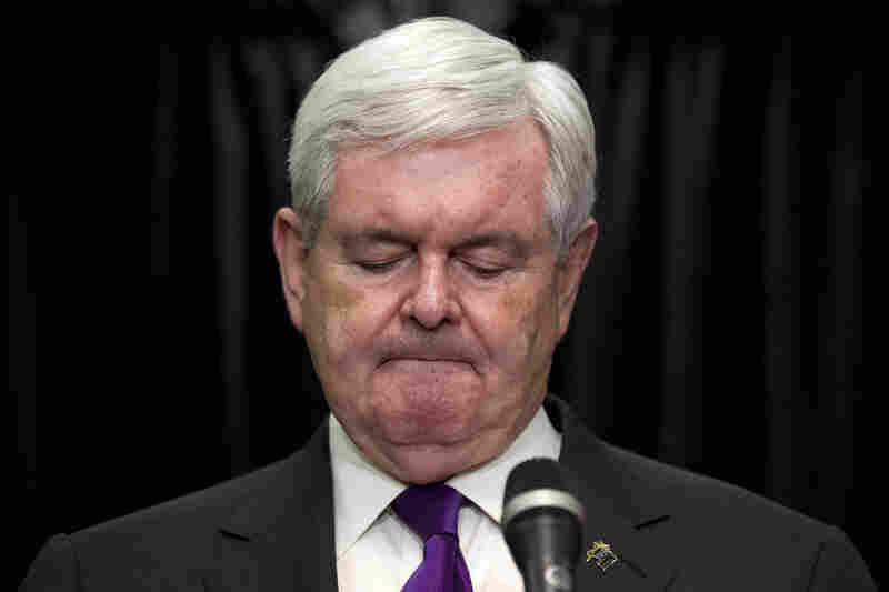 Newt Gingrich pauses while announcing that he is suspending his presidential campaign, Wednesday, May 2, in Arlington, Va. 