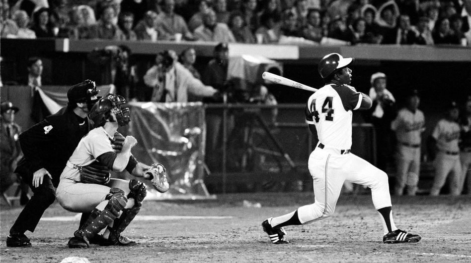 Hank Aaron breaks Babe Ruth's record for career home runs as he hits No. 715 at Atlanta-Fulton County Stadium on April 8, 1974, on his way to a career 755 home runs. Research suggests that in a wide variety of professions, including collegiate and professional sports, a small but significant number of individuals perform exceedingly well and the rest of individuals' performance trails off. (AP)