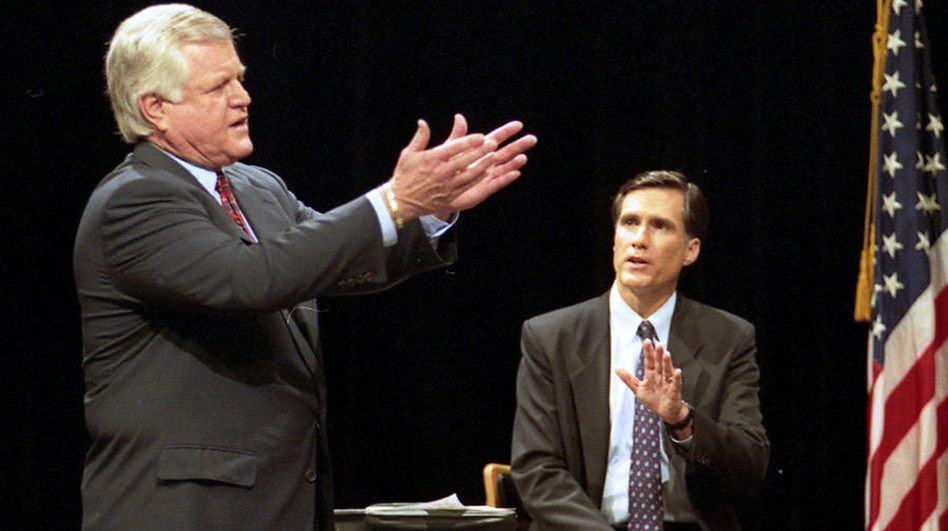 Sen. Ted Kennedy, D-Mass., and Republican challenger Mitt Romney (right) take part in a televised debate at Holyoke Community College in Holyoke, Mass., in 1994. Romney lost to Kennedy in his first political race. (Charles Krupa/AP)