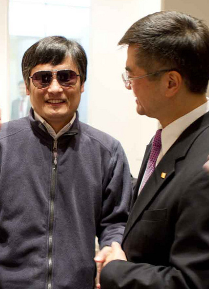 Chen Guangcheng, left, with U.S. Ambassador Gary Locke on Tuesday at the U.S. embassy in Beijing. (State Department)