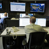Cybersecurity analysts work in the watch and warning center during the first tour of the government's secretive cyberdefense lab intended to protect the nation's power, water and chemical plants, electrical grid and other facilities on Sept. 29, 2011, in Idaho Falls, Idaho. Cybersecurity analysts work in the watch and warning center during the first tour of the government's secretive cyberdefense lab intended to protect the nation's power, water and chemical plants, electrical grid and other facilities on Sept. 29, 2011, in Idaho Falls, Idaho.