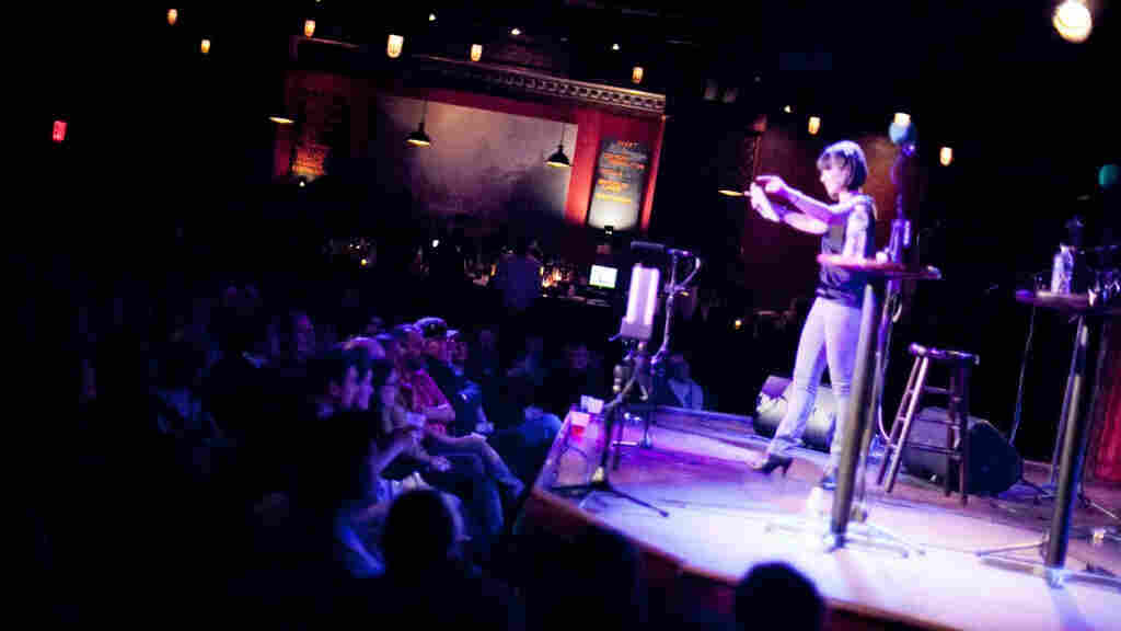 Ask Me Another host Ophira Eisenberg stirs up the audience during a live taping at the Bell House in Brooklyn, NY.