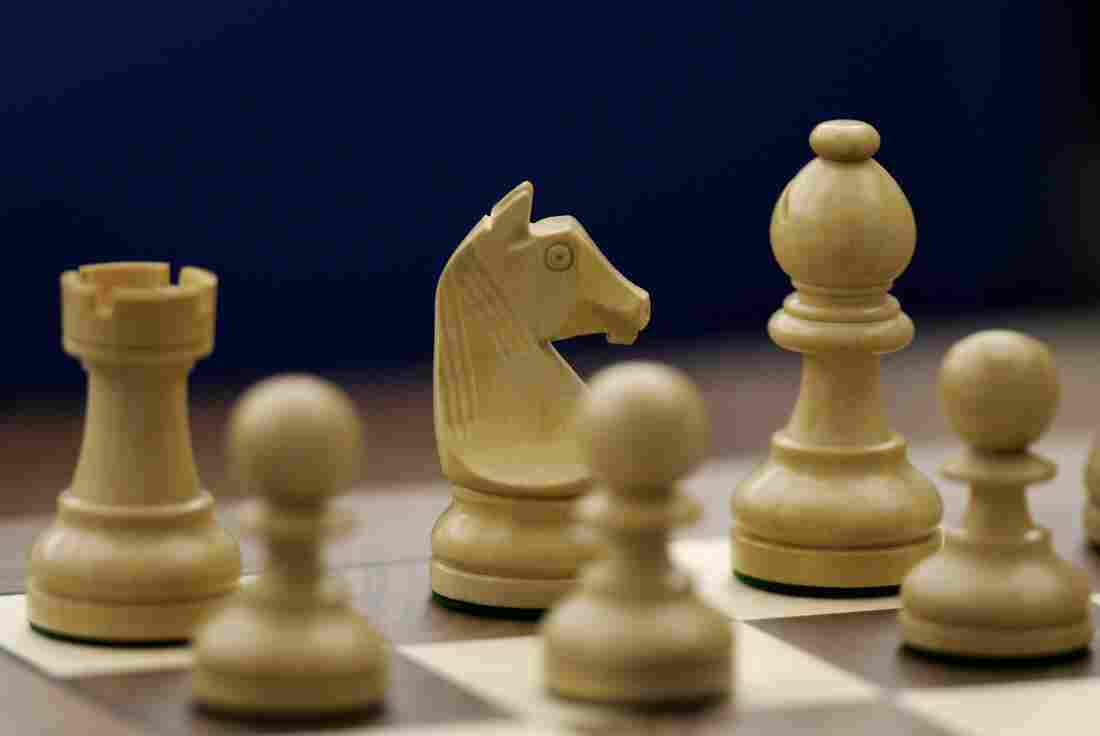 Chess pieces on a chess board.