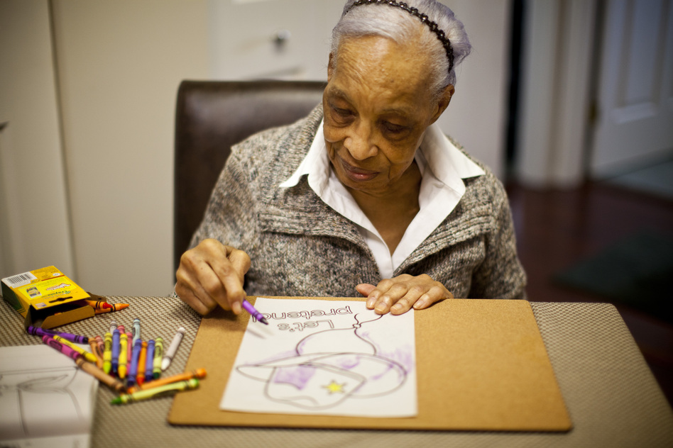 Maryland resident Ida Christian, 89, began showing symptoms of Alzheimer's disease in 2009. Her daughter, Geneva Hunter, and granddaughter, Yolanda, decided to take a hands-on approach to Ida's care. Ida lives with Geneva, and Yolanda quit her job to become Ida's daytime caregiver. (Kainaz Amaria/NPR)