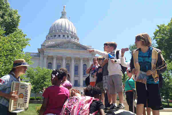 Fourth graders from Wauwatosa get a lesson in democracy while on a field trip to the state Capitol in Madison.