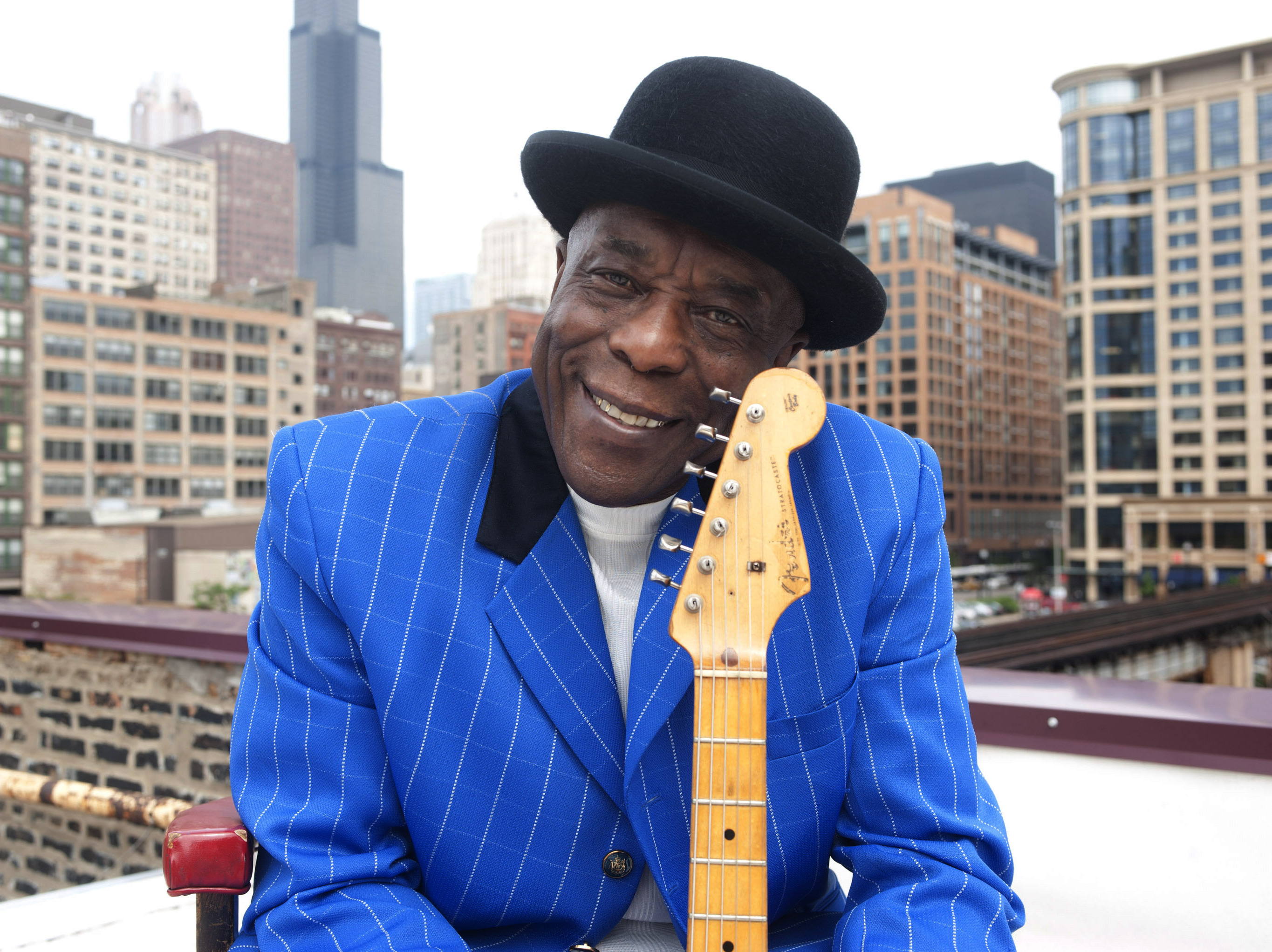&quot;I didn't learn nothing from a book,&quot; Buddy Guy tells NPR's Neal Conan. &quot;I learned by ... being quiet, keep your ears open and listen.&quot;
