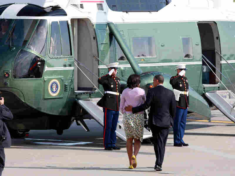 President Obama and first lady Michelle Obama board Marine One at John F. Kennedy International Airport in New York on Thursday. The Obamas were in New York for fundraisers and a tour of One World Trade Center.