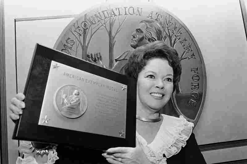 Temple receives an award for public service and patriotism presented by the Freedoms Foundation in Philadelphia in 1980.