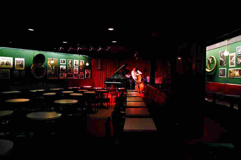 Protected from the glare of sunlight, the little wedge-shaped room is peaceful in the afternoon. Musicians will sometimes come to practice here, among the spirits of jazz past, before their performances in the evening.