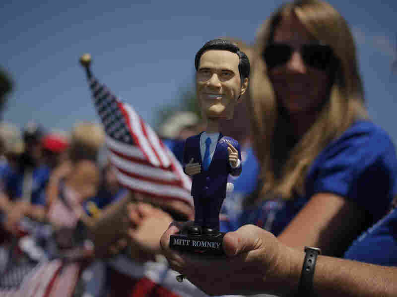 A bobblehead doll of Republican presidential candidate Mitt Romney at the July 4 parade in Wolfeboro, N.H.