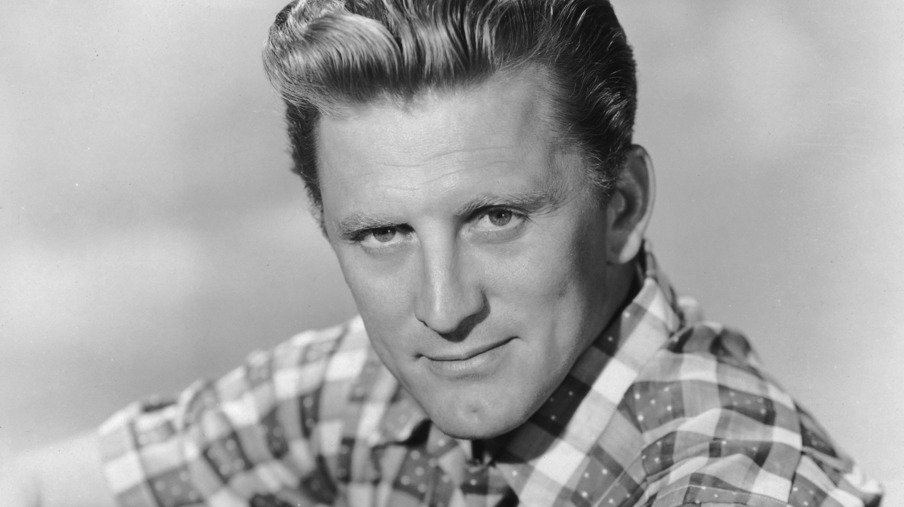 Actor Kirk Douglas, shown above at 39, was born Issur Danielovitch in New York to Russian-Jewish parents. He would later tell his own children that they didn