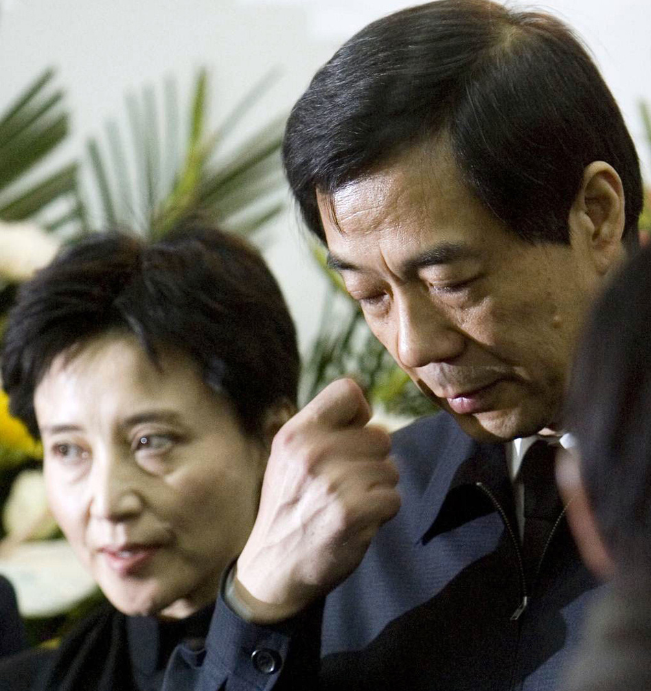 Gu Kailai, left, and her husband, Bo Xilai, in 2007. She's been charged with murder. (Kyodo/Reuters /Landov)