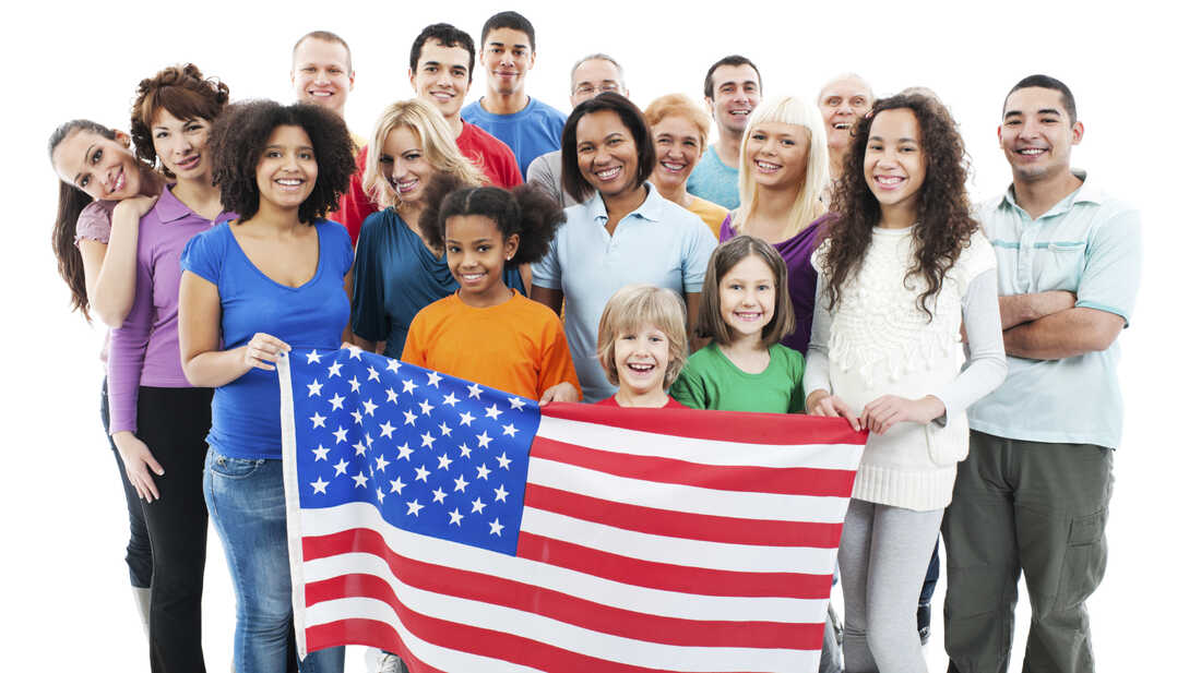 Group of people with an American flag.