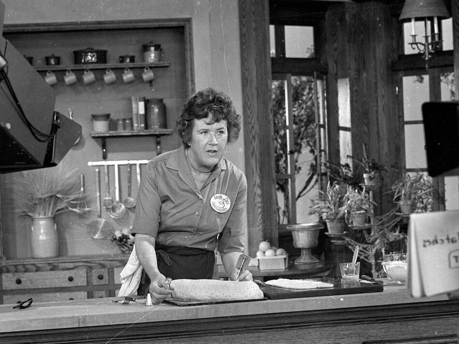 Julia Child prepares a French delicacy in her cooking studio on Nov. 24, 1970. (AP)