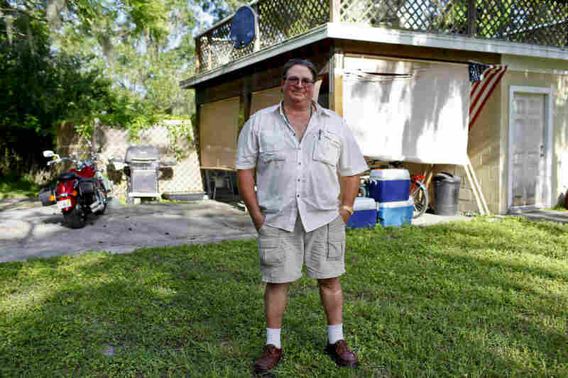 Gregory Brown, 52, used to be a glazier installing plate-glass windows. He now lives off of unemployment checks, plus the disability checks of a woman who lives with him in Lutz, Fla. Brown is selling his motorcycle to help pay the bills. He is eager to vote President Obama out this fall, and says he plans to register to vote before the election.