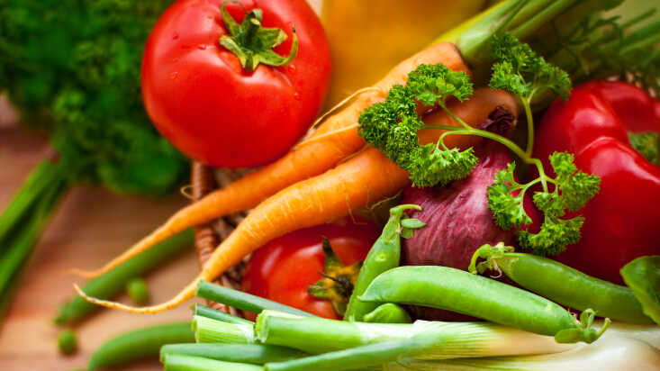 Fresh vegetables in a basket.