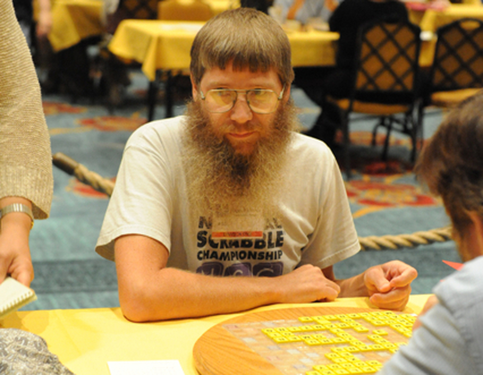Four-time National Champion Nigel Richards. He won again today, becoming the first person to win four National Scrabble Championships and the first to win three titles in a row. A younger player, though, was caught cheating. (North American Scrabble Players Association)