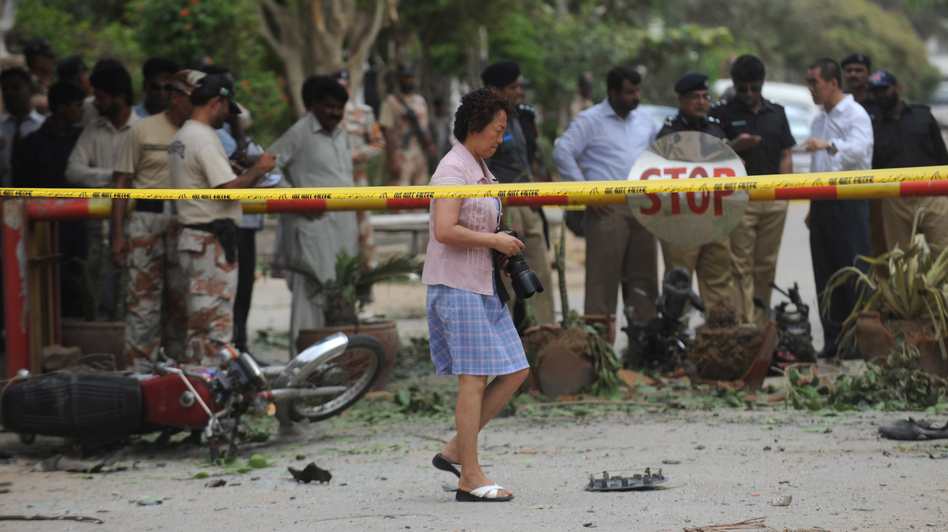 China is planning to increase investments in Pakistan, and some Pakistanis feel China is trying to become a new colonial power. Amid these tensions, a bomb went off near the Chinese Consulate in Karachi, Pakistan, on July 23. The blast injured two people. (Rizwan Tabassum/AFP/Getty Images)