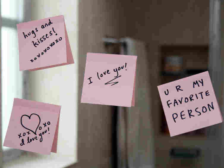 Love notes stuck on a mirror.