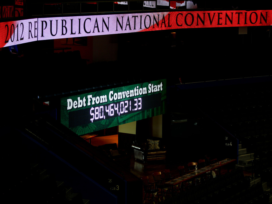 Within minutes after being turned on Monday, the GOP's clock measuring how much the national debt had grown was moving up quickly. (Becky Lettenberger/NPR)