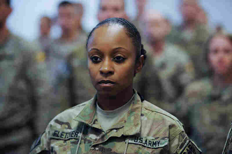 A U.S. soldier with the NATO-led International Security Assistance Force looks on during a Sept. 11 memorial ceremony Tuesday at Kaia airport in Kabul, Afghanistan.