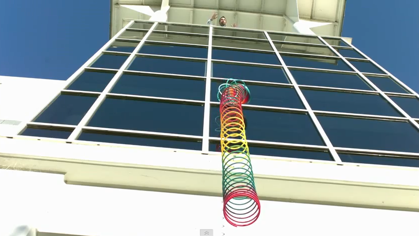Slinky half-collapsed, midair.