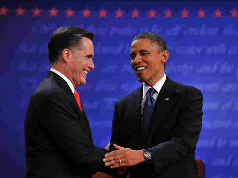 President Obama and Republican Mitt Romney shake hands following their first debate at the University of Denver on Oct. 3.