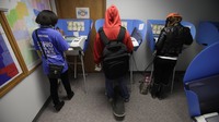 Voters cast their ballots during early voting in Bowling Green, Ohio. Early voting began Oct. 2 in the battleground state, five weeks before Election Day on November 6.