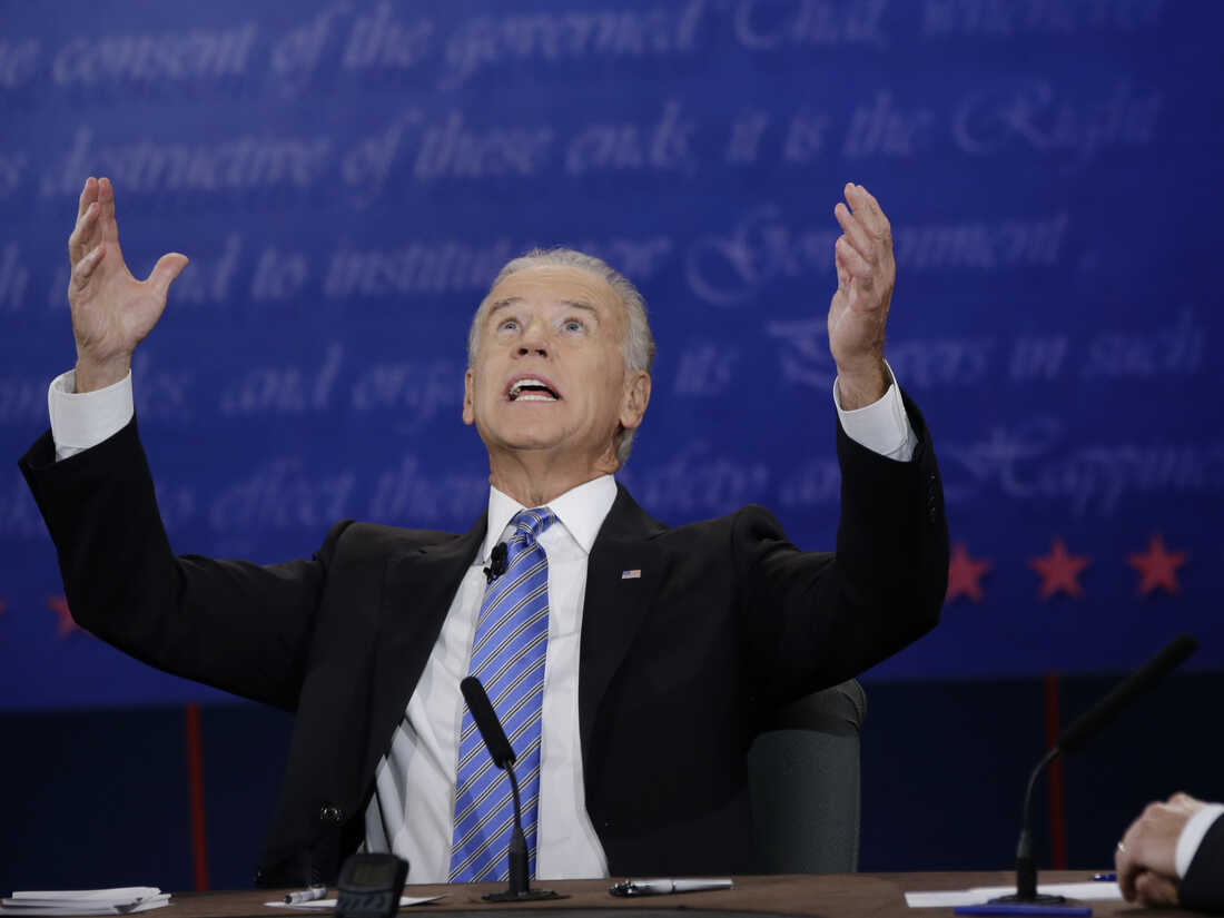 Republican vice presidential nominee Rep. Paul Ryan, of Wisconsin, right, watches as Vice President Joe Biden, speaks during the vice presidential debate at Centre College, Thursday, Oct. 11 in Danville, Ky.