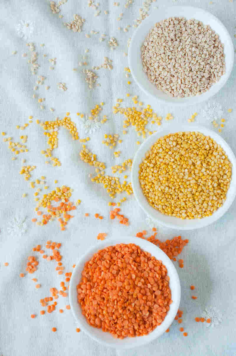 (From bottom) Masoor dal, or pink lentils, split yellow mung beans and split skinless black gram.