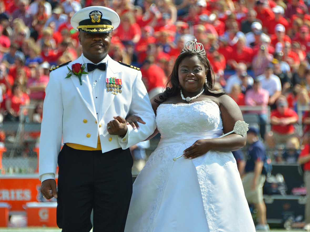 University of Mississippi Homecoming Queen Courtney Pearson, as she was escorted on to the football field last Saturday by her father, Cmdr. Kerry Pearson. (UM Communications)