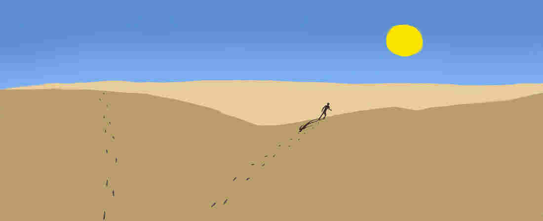 Man on sand dunes.