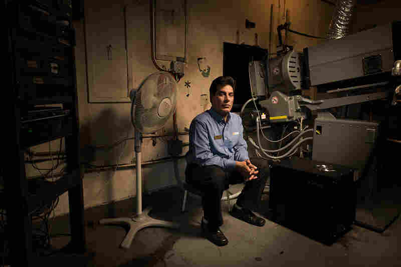 Projectionist Nadeem Malik at the Bombay Theater, Flushing, N.Y.