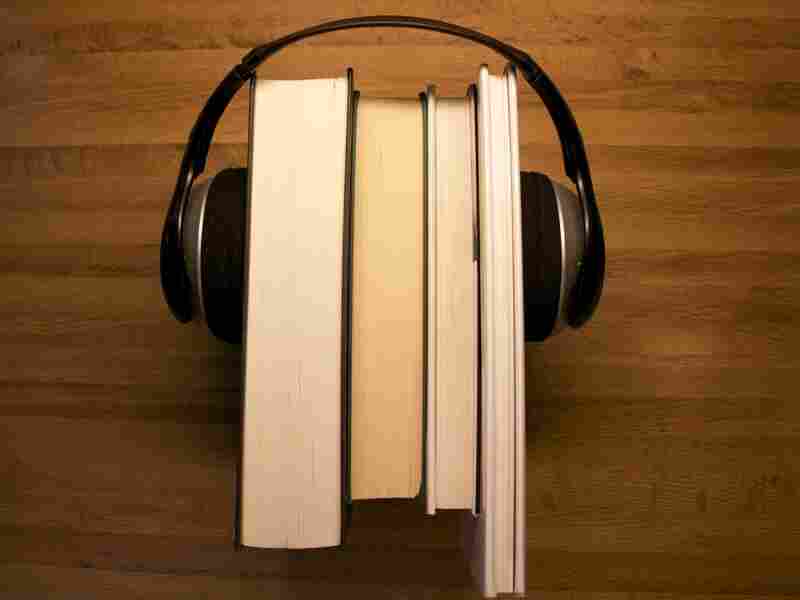 books with headphones on