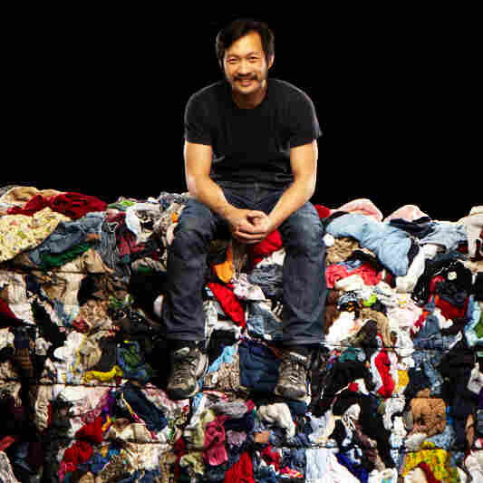 Wesley Law poses atop one of the bales in the Goodwill Outlet store in St. Louis. Wesley Law poses atop one of the bales in the Goodwill Outlet store in St. Louis.